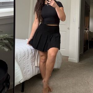 Lumiere Pleated Black Mini Skirt